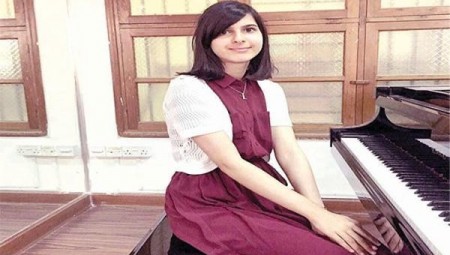 لولوة الشملان أول عازفة كويتية تصل العالمية