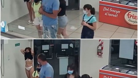 في احتجاج غريب.. سيدة تخلع فستانها وتستخدمه كقناع للوجه